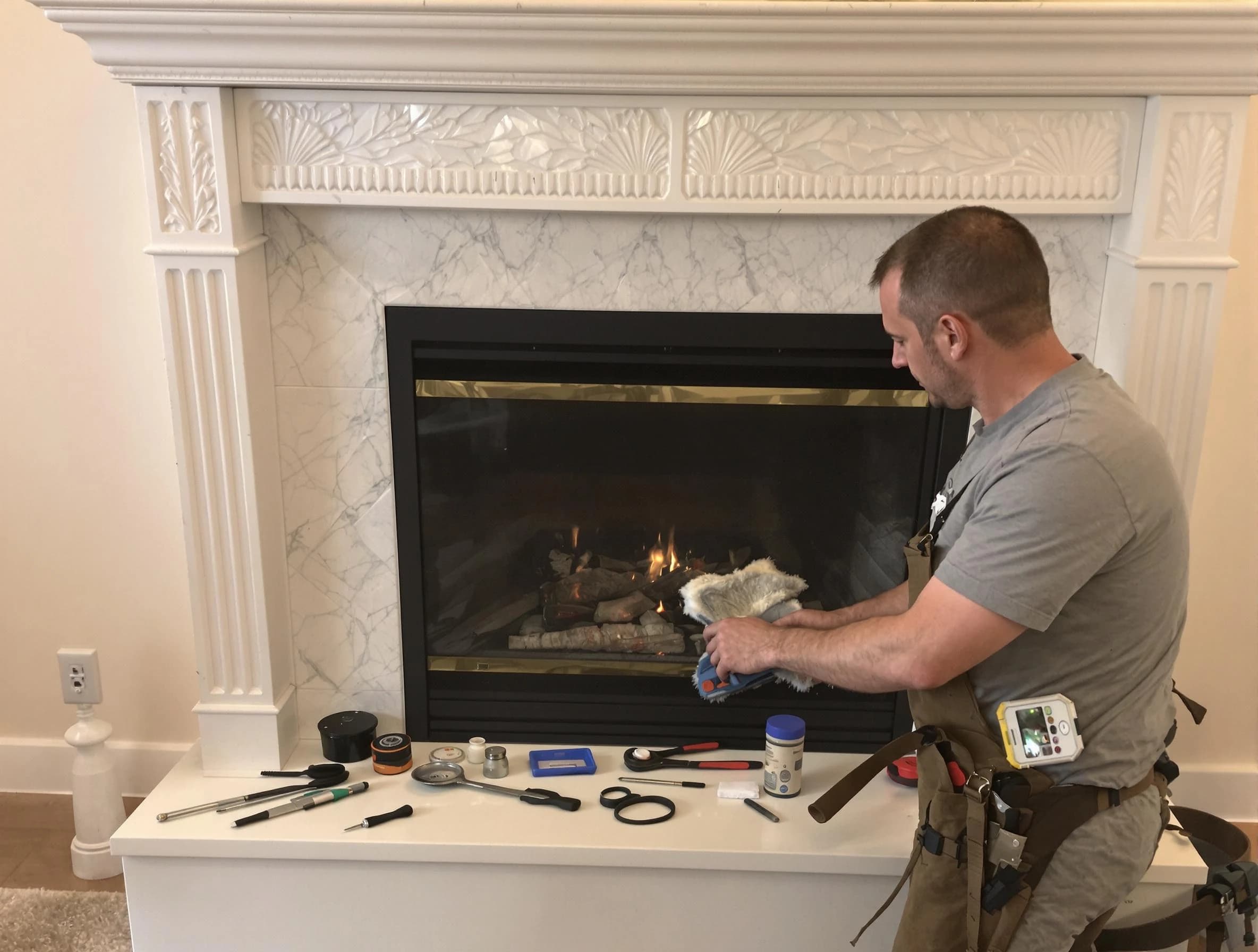 North Decatur Chimney Sweep performing fireplace maintenance in North Decatur, GA